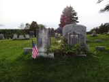 Могила Дж. Уилера на Fairview Cemetery  Benson, Rutland County, Vermont, USA. Место отмечено флагом. Надгробия пока нет